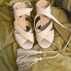 Beautiful cream colored leather open toe ankle tie high heels